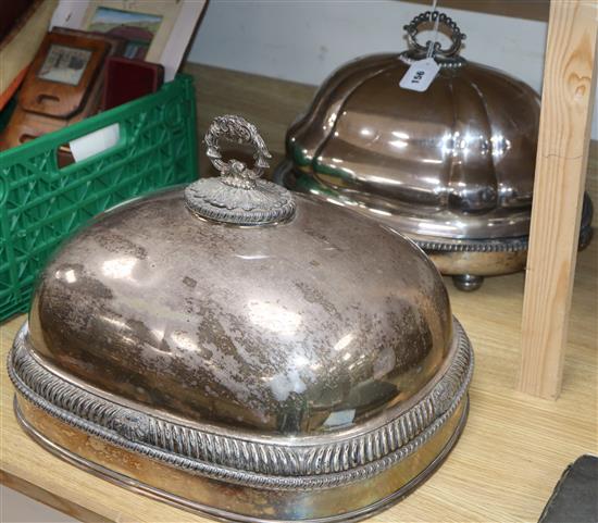 A silver-plated meat dish and dome, height 36cm and a separate dome